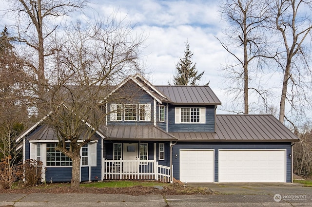 view of front facade with a garage and covered porch