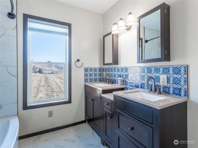 bathroom with backsplash and vanity