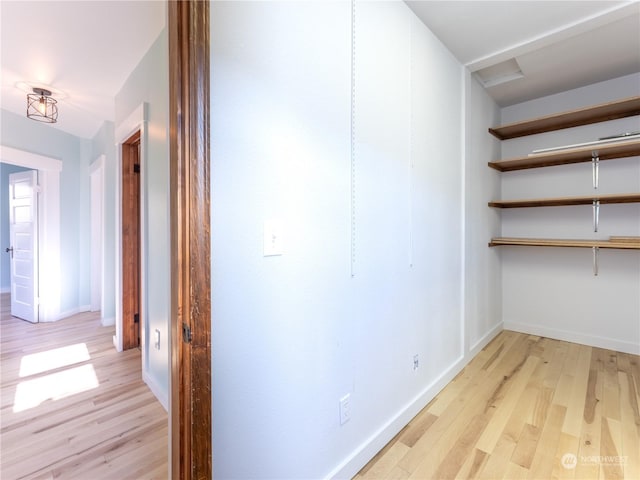 hallway featuring light wood-type flooring