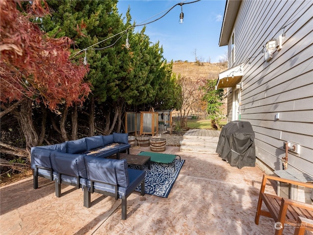 view of patio / terrace with an outdoor living space and grilling area