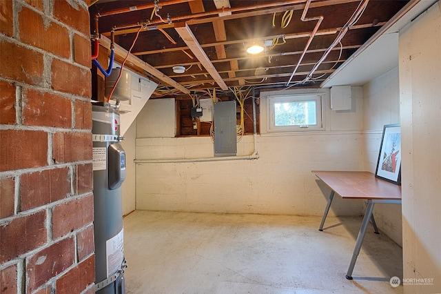 basement featuring strapped water heater and electric panel