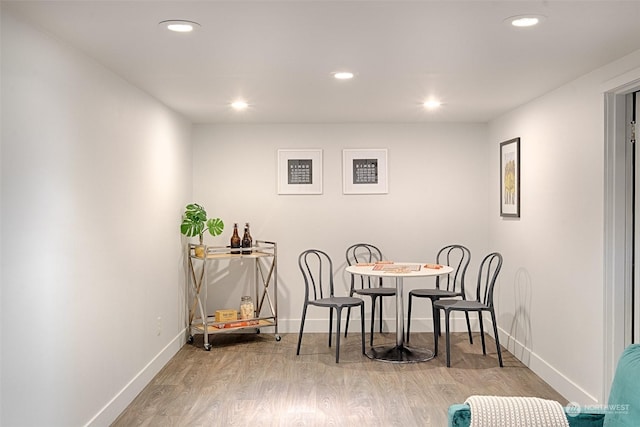 dining area featuring light wood-type flooring