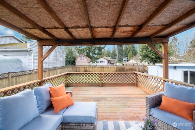 deck featuring a storage shed