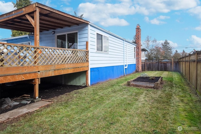 view of property exterior with a yard