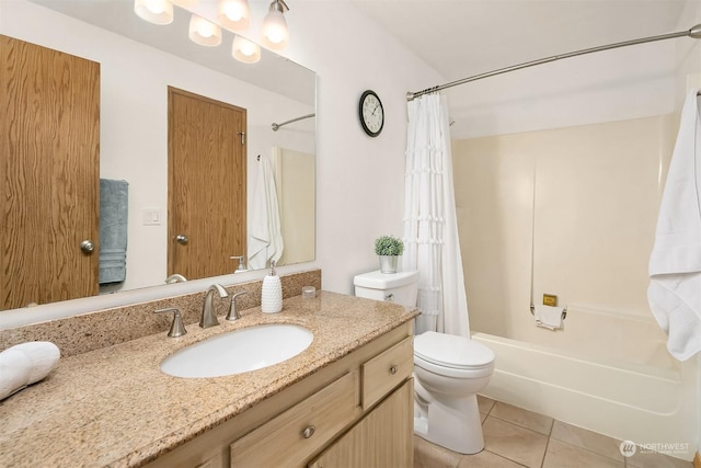 full bathroom featuring vanity, toilet, tile patterned flooring, and shower / bath combo