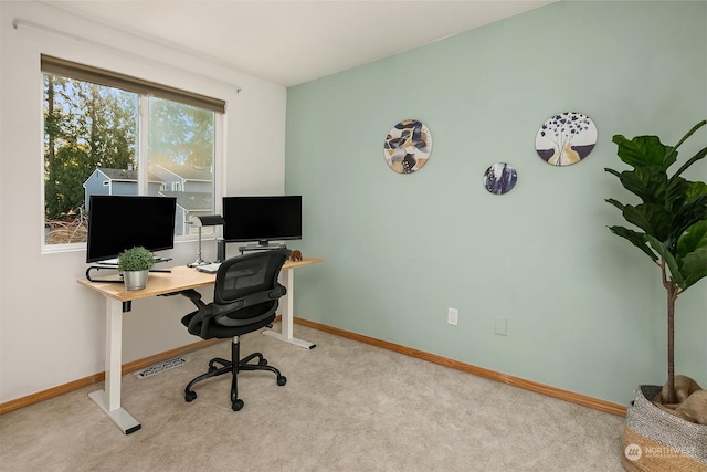 view of carpeted office space