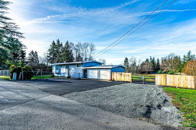 single story home with a garage