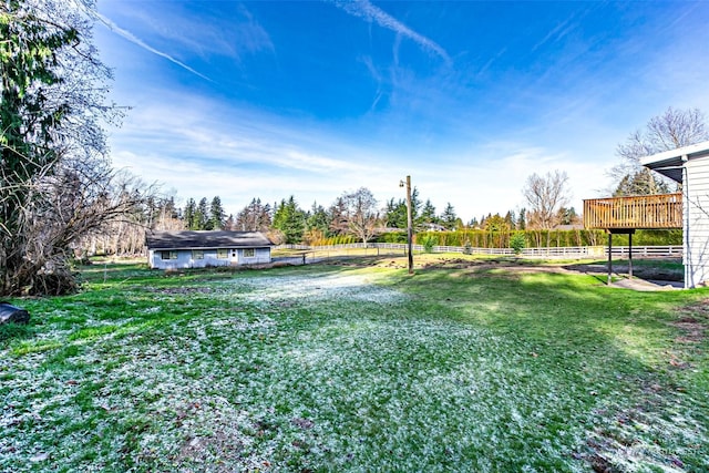 view of yard with a deck