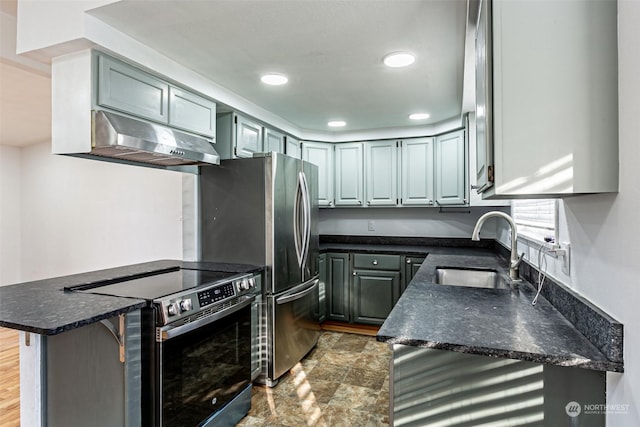 kitchen with sink, kitchen peninsula, and stainless steel range with electric cooktop