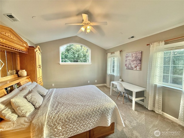 bedroom with lofted ceiling, carpet, visible vents, and baseboards