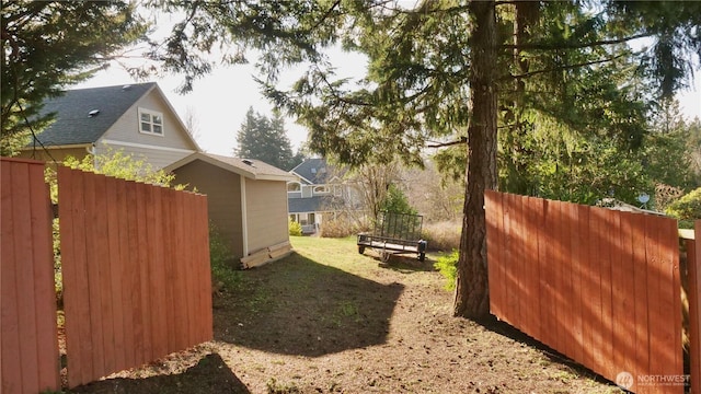 view of yard with fence