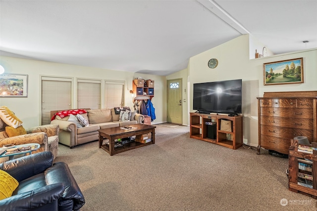 living room with lofted ceiling and carpet floors