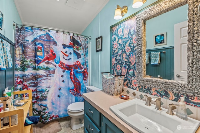 bathroom with vanity, a shower with curtain, ornamental molding, and toilet