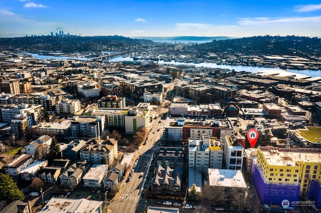 drone / aerial view with a water view