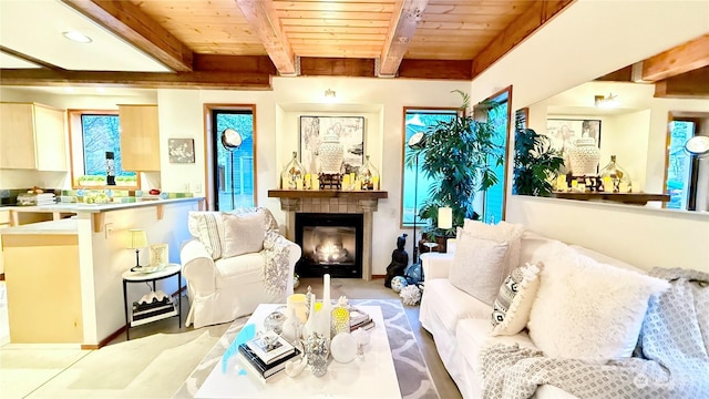 sitting room with beamed ceiling and wood ceiling