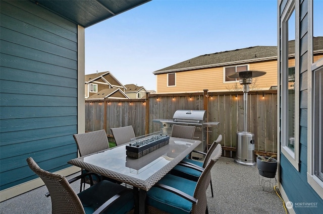 view of patio / terrace featuring area for grilling and an outdoor fire pit