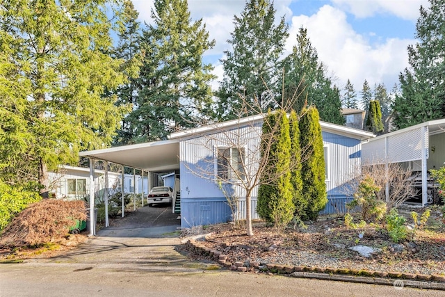 view of front facade with a carport