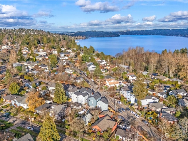 bird's eye view with a water view