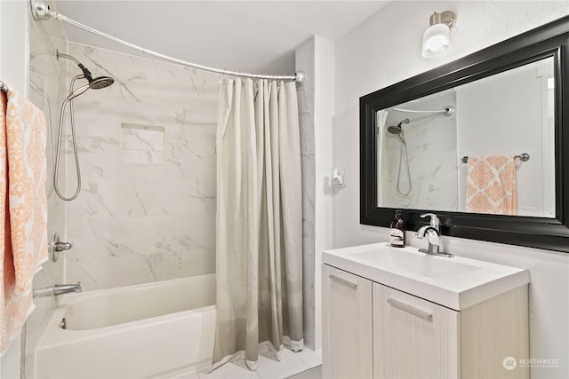 bathroom featuring vanity and shower / bath combination with curtain