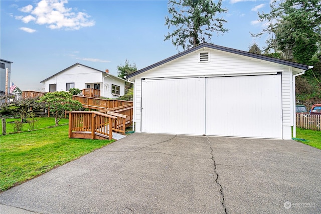 garage with a yard