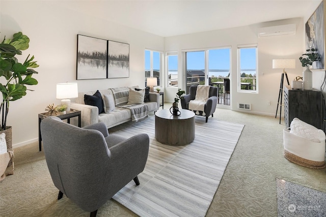 living room with a water view and an AC wall unit