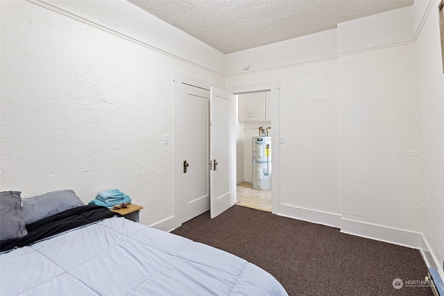 unfurnished bedroom with dark colored carpet, a textured ceiling, and secured water heater