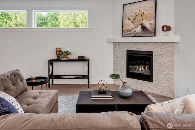 17018 106th Ave SE Unit 11, Renton, WA 98055 - living room with wood finished floors and a fireplace