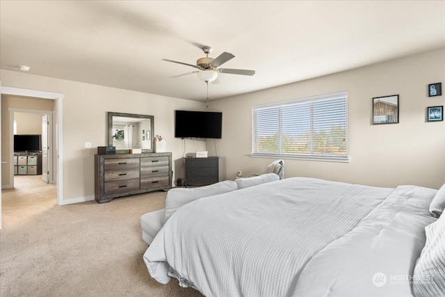 bedroom with light carpet and ceiling fan