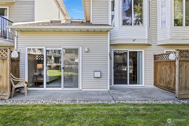 rear view of property featuring a patio