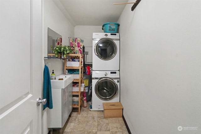 laundry room featuring stacked washer / dryer