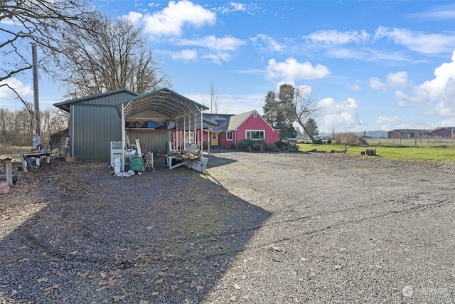 exterior space featuring a carport