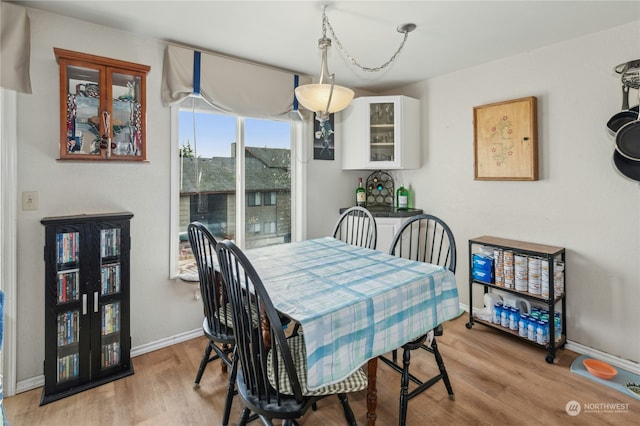 dining room featuring light hardwood / wood-style flooring