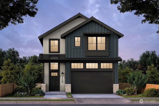 view of front of property with a garage