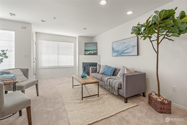 living room featuring light colored carpet