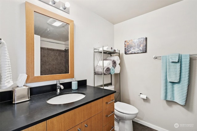 bathroom with vanity and toilet