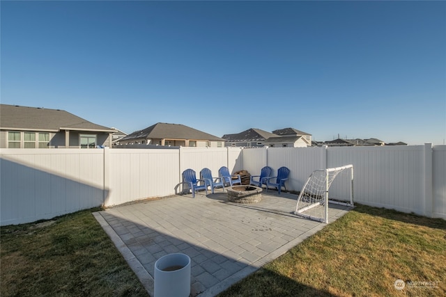 view of patio / terrace with a fire pit