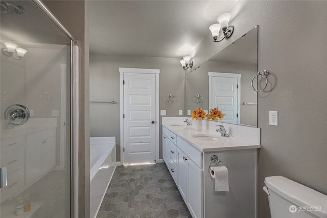 full bathroom with vanity, separate shower and tub, and toilet