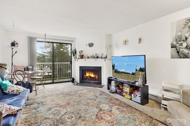 living room with carpet and a textured ceiling