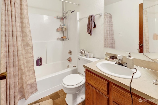 full bathroom featuring toilet, tile patterned floors, shower / bathtub combination with curtain, and vanity