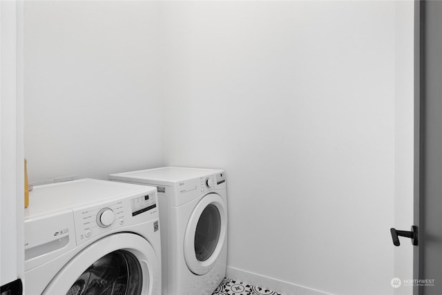 laundry room with washer and dryer