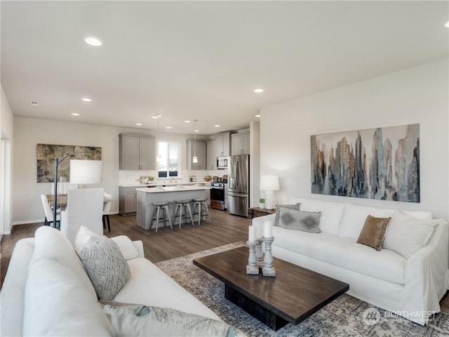 living room featuring dark hardwood / wood-style floors