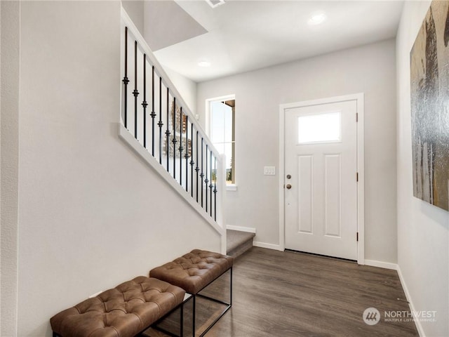 foyer featuring dark wood-type flooring