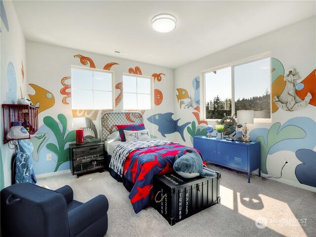 bedroom featuring light colored carpet