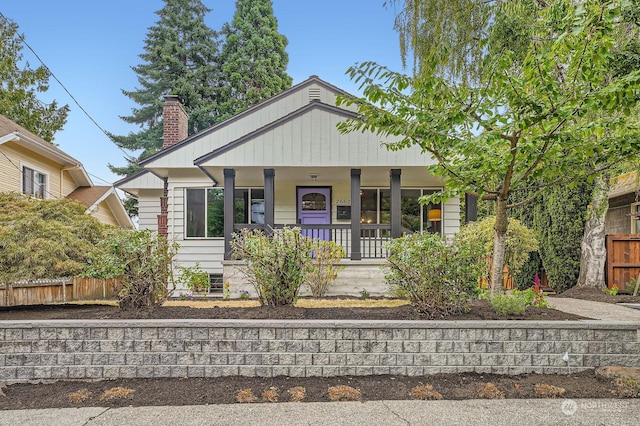 bungalow-style home featuring covered porch