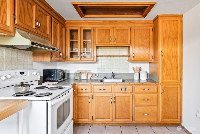 22214 Zenker Valley Rd SW, Centralia, WA 98531 - kitchen featuring sink, electric range, and light tile patterned floors