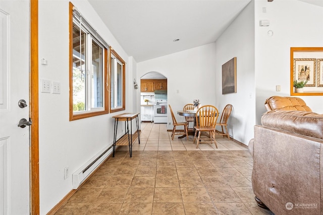 22214 Zenker Valley Rd SW, Centralia, WA 98531 - interior space with light tile patterned floors, a baseboard heating unit, and vaulted ceiling
