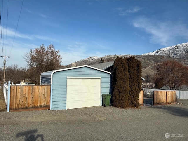 garage featuring a mountain view