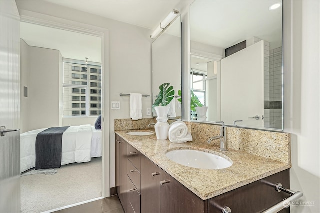 bathroom with vanity and tile patterned floors