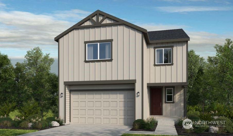 view of front of home with a garage