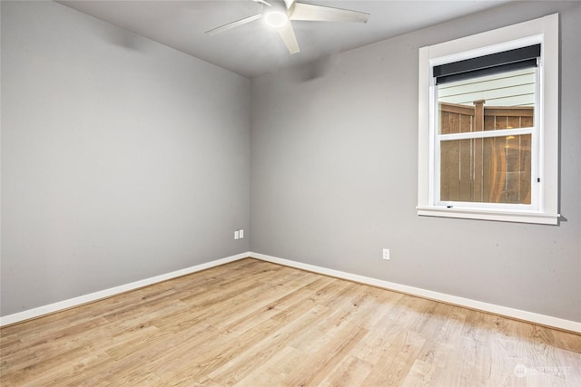 spare room with ceiling fan and light hardwood / wood-style flooring